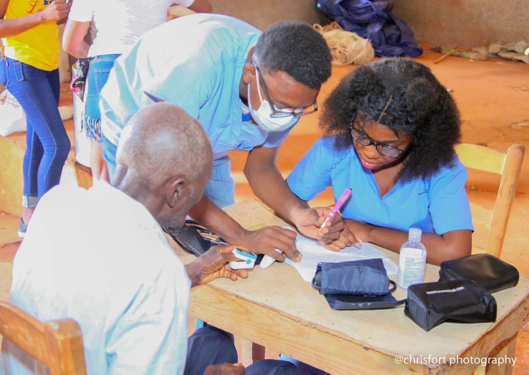 Medical professionals providing free consultations at mobile clinic